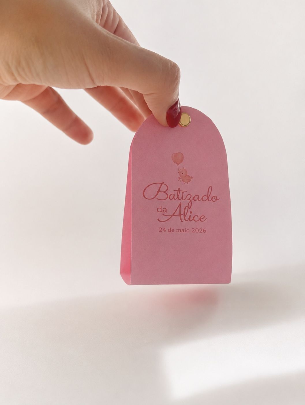 Lembrança personalizada de batizado em tons de rosa com vela